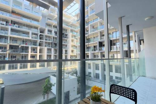 1BR Masdar City - Elegant Stay with Pool & Balcony