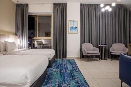 Golden Tulip Amman - Tap to explore photos