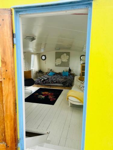 The Island Houseboat - Tap to explore photos