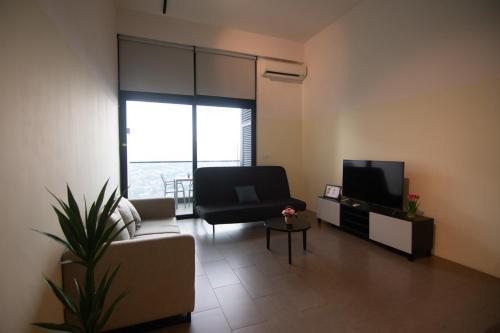 A Lovely High-Floor Loft at EST Brickfields - Tap to explore photos