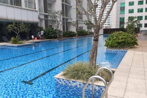Cozy M Suites Android Box, Pool and City Area - Tap to explore photos