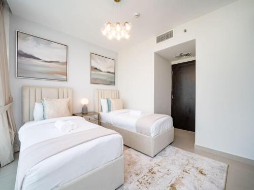 Sleek 2 Bed in Sports City - Tap to explore photos