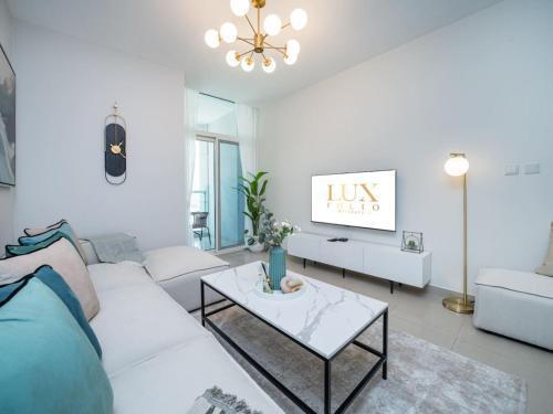 Sleek 2 Bed in Sports City - Tap to explore photos