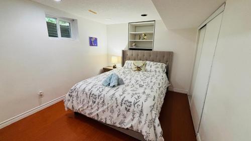 Cozy Walkout Basement with Tranquility - Tap to explore photos