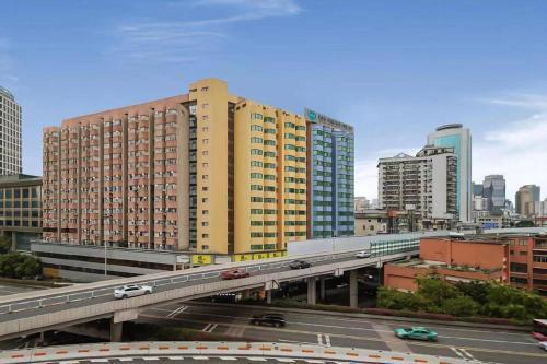 WAIFIDEN Hotel - Former Tokai Hotel (Free shuttle bus during Canton Fair) - Tap to explore photos