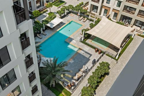 Community view home-Dubai Creek Harbour - By DuStay - Tap to explore photos