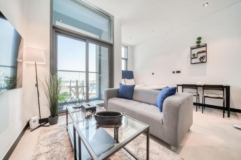Stunning 2BR APT with Spa, Pool, Gym, Playground - Tap to explore photos