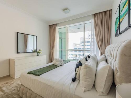Seaside Elegance-1BR-Al Bateen-Private Beach Access - Tap to explore photos