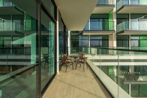 Vacay Lettings - Binghatti Emerald,JVC- Pool View