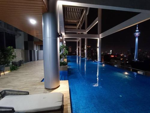COL 93B Balcony KLCC View & Infinity Pool Studio - Tap to explore photos