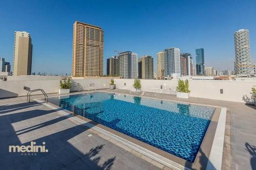 Large studio in JVC - Dubai - Tap to explore photos