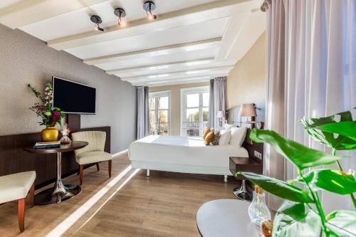 NH Collection Barbizon Palace Apartments - Tap to explore photos
