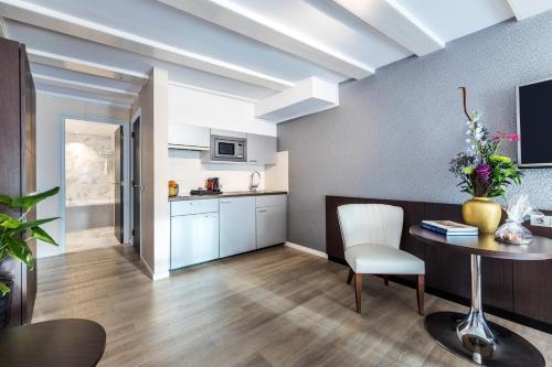 NH Collection Barbizon Palace Apartments - Tap to explore photos