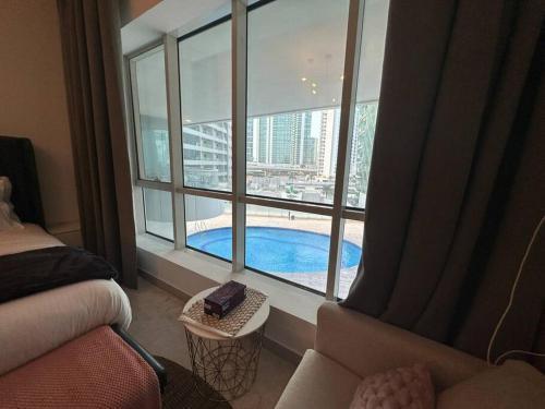 Cozy 2BHK with Marina Views - Tap to explore photos