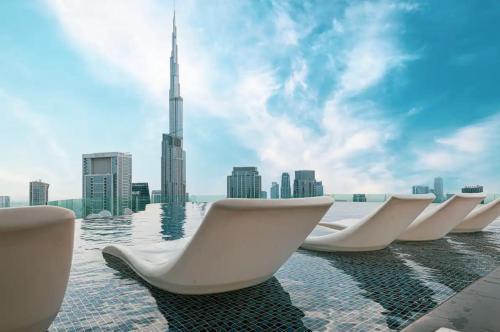 64th Floor Highest Downtown Infinity Pool Burj Khalifa View - Tap to explore photos