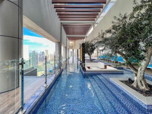 Paramount Residences I Access to Infinity Pool - Tap to explore photos