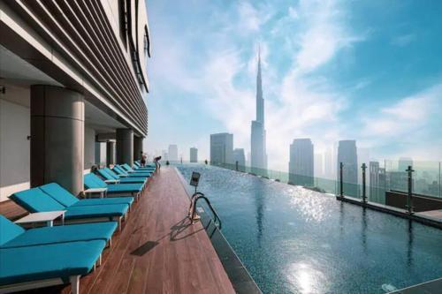 Highest Infinity Pool Burj Khalifa View - Tap to explore photos