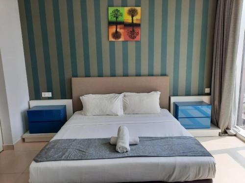 The Home suites - Tap to explore photos