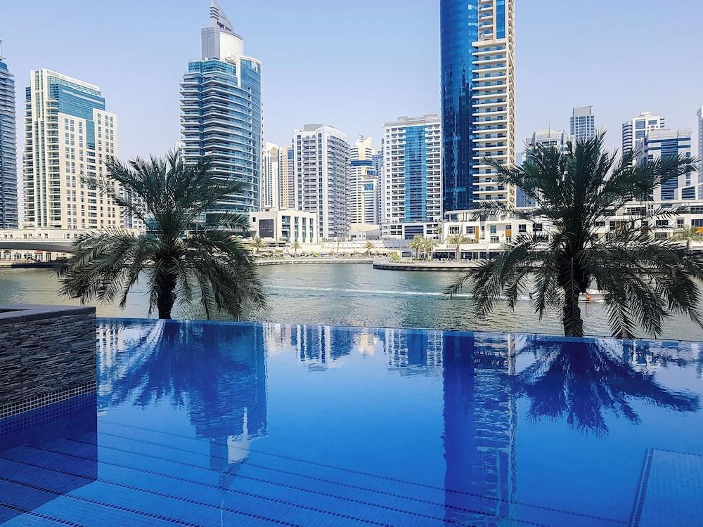 Maison Privee - Blissful Living w/ Dubai Marina Waterfront Views - Tap to explore photos
