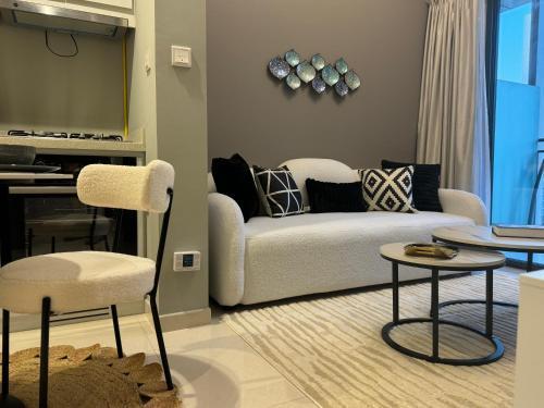 ASHRI HOLIDAY HOMES STYLISH Apartment near Burj Khalifa - Tap to explore photos