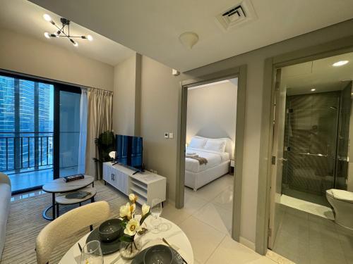 ASHRI HOLIDAY HOMES STYLISH Apartment near Burj Khalifa - Tap to explore photos