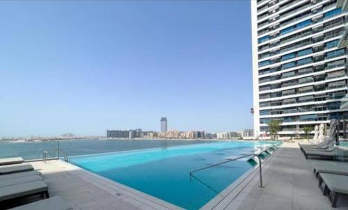 White Sage Sun and Sand 1BR at Beach Isle Emaar BeachFront - Tap to explore photos