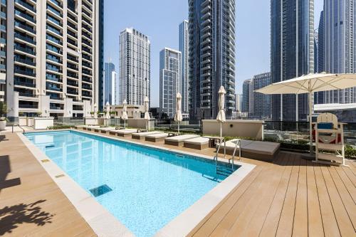 Elegant Apartment Walk to Burj Khalifa & Dubai Mall - Tap to explore photos
