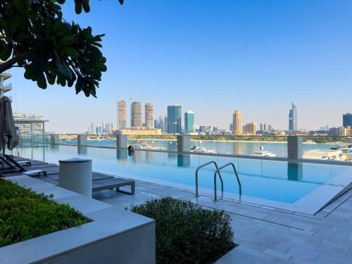 Coastal Chic 1 Bedroom Apartment w private beach - Tap to explore photos