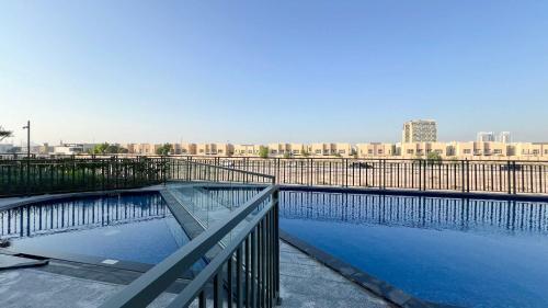 Legacy by Sunrise - Top Amenities and Paddle Court - Tap to explore photos