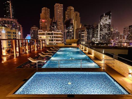 Elite Waterfront 3BR Haven - Marina and Sea Views! - Tap to explore photos