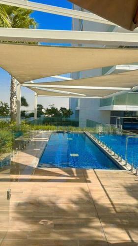 Modern Studio on Golf Course - Damac Hills - Tap to explore photos