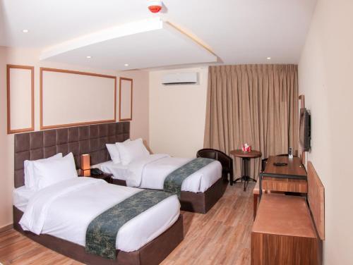 POST Hotel Amman Room Type - Deluxe Double or Twin Room POST Hotel Amman Room Type - Deluxe Double or Twin Room