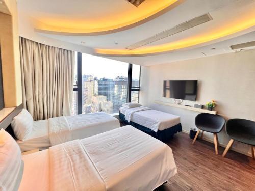 Epoch Hotel Room Type - Deluxe Triple Room