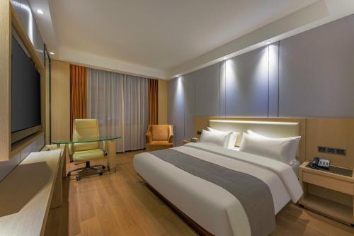 Meihao Mingyue Hotel International Finance City Keyun Road Metro Branch Room Type - Business Queen Room