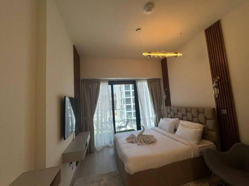 Stunning Studio in Meydan Azizi 42 - Tap to explore photos