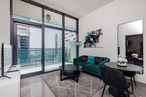 Stylish 1BR Apartment at DAMAC Merano Tower with Great View - Tap to explore photos