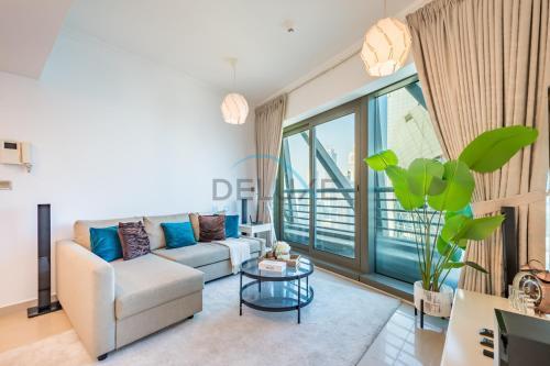 Elegant 1BR in Park Towers, DIFC by Deluxe Holiday Homes - Tap to explore photos