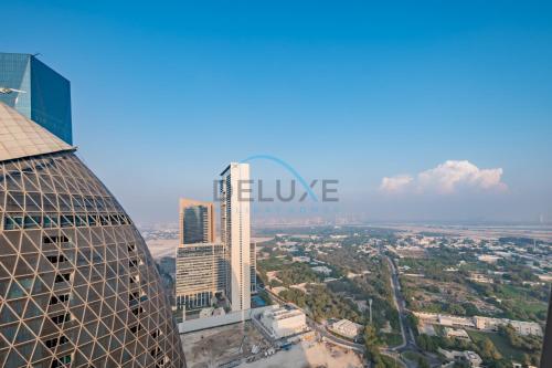 Elegant 1BR in Park Towers, DIFC by Deluxe Holiday Homes - Tap to explore photos