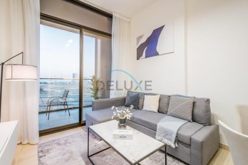 Minimalist 1BR in Binghatti Luna, JVC by Deluxe Holiday Homes - Tap to explore photos