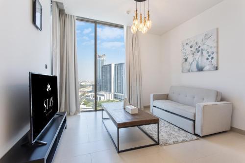 STAY BY LATINEM Luxury 1BR Holiday Home CV B1311 near Burj Khalifa - Tap to explore photos