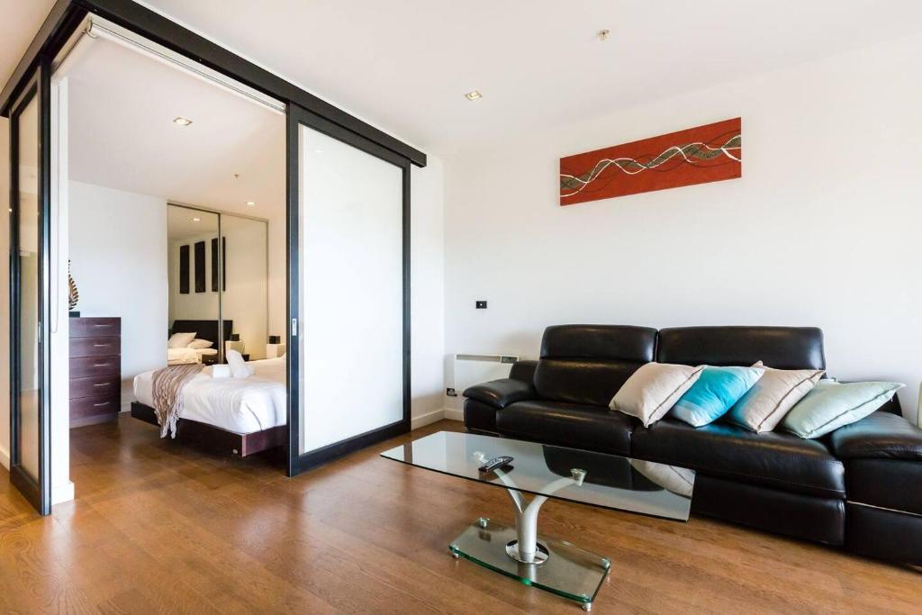 Southside St Kilda Seclusion with Balcony and Parking - Tap to explore photos