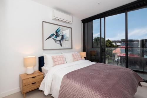 Bayside living at The Hampton - Tap to explore photos