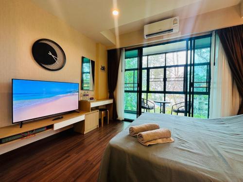 Brand Naithon Condo C411 - Tap to explore photos