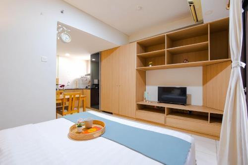 Tamansari Sudirman Apartment by AbdiHome - Tap to explore photos