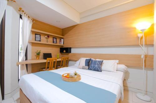 Tamansari Sudirman Apartment by AbdiHome Room Type - Deluxe Double Studio