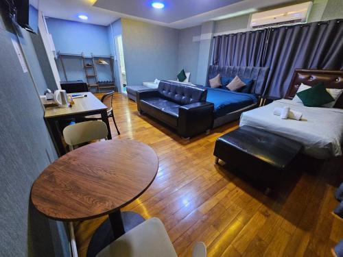 แกร็บสลีปโฮสเทล แอร์พอร์ตดอนเมือง Room Type - Quadruple Room with Private Bathroom แกร็บสลีปโฮสเทล แอร์พอร์ตดอนเมือง Room Type - Quadruple Room with Private Bathroom