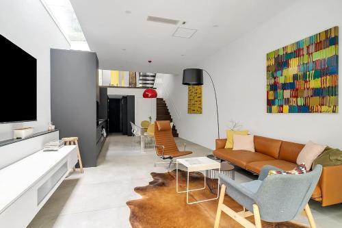 The Mod - Striking Split Level Gem in Sydney's West - Tap to explore photos