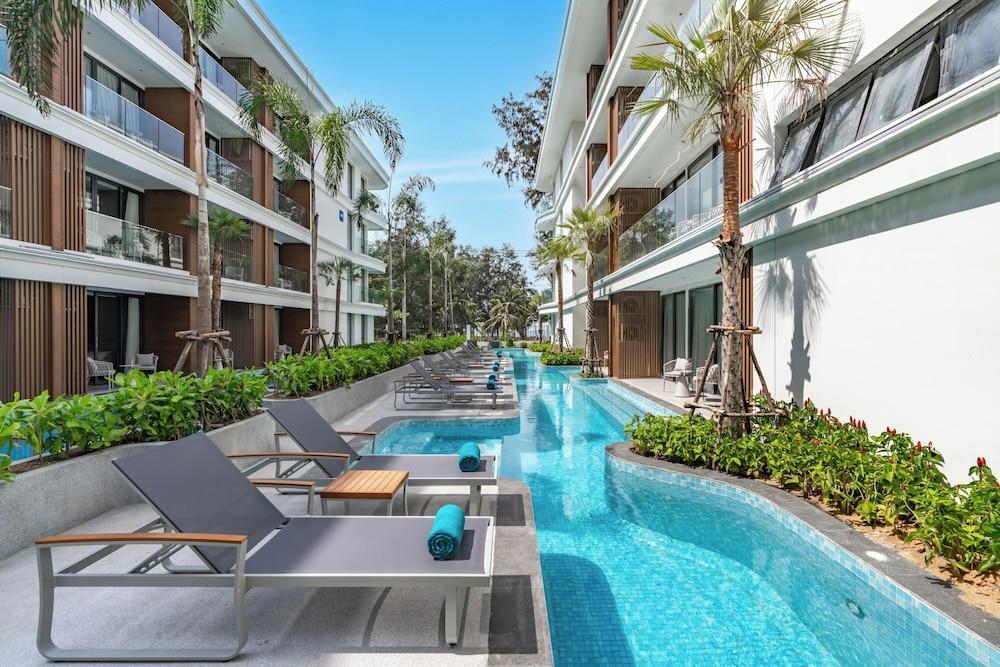Kora Beach Resort Phuket Room Type - Premier Double Room, 1 King Bed, Pool View, Poolside Kora Beach Resort Phuket Room Type - Premier Double Room, 1 King Bed, Pool View, Poolside