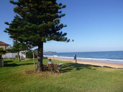Spacious 2BR Beachfront Apartment - The Coachhouse - Tap to explore photos