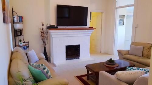Spacious 2BR Beachfront Apartment - The Coachhouse - Tap to explore photos